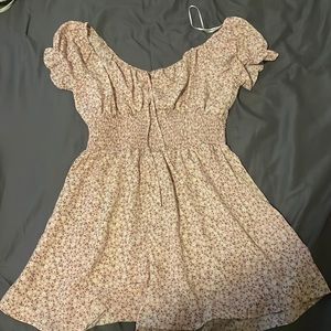 I’m selling this romper ,pink with flowers, size medium